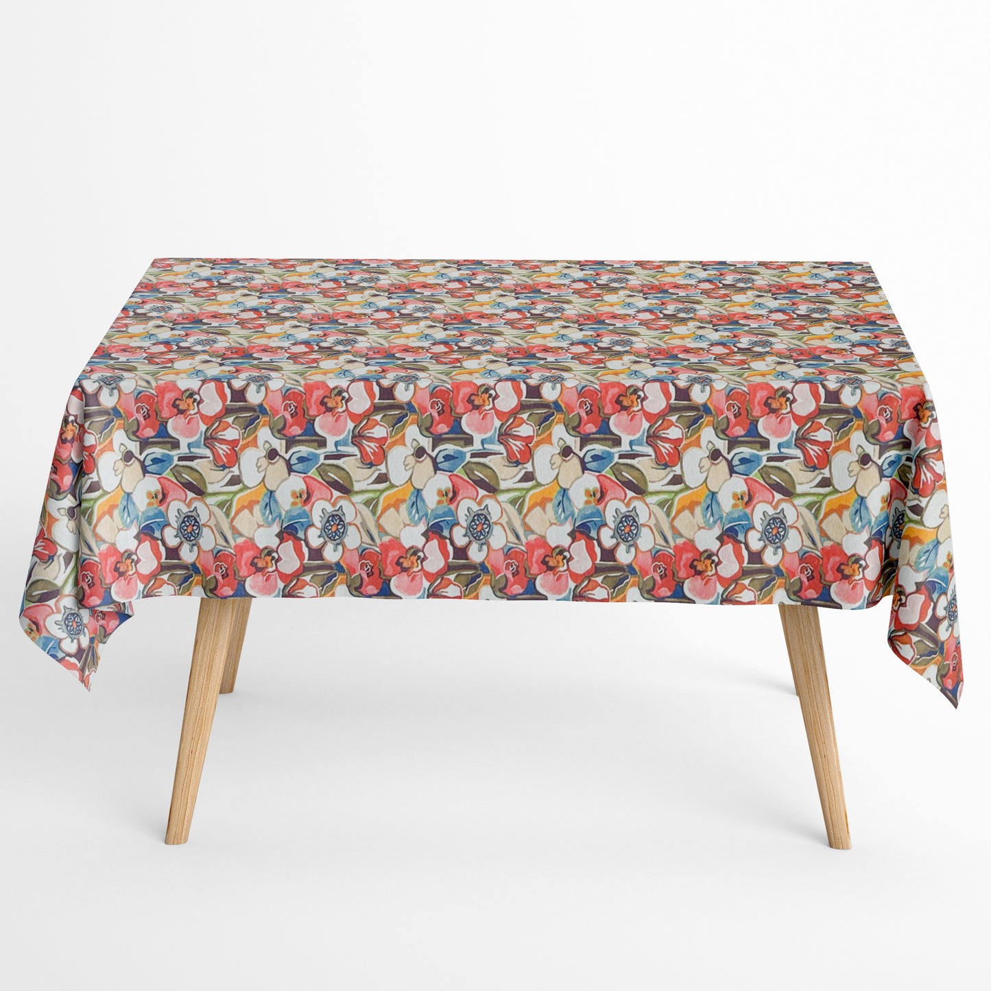 Die Jacquard Tischdecke aus beschichteter Baumwolle zeigt ein dichtes, stilisiertes Blumenmuster mit grafischen Blüten und Blättern in warmen Rot-, Beige- und Blautönen.