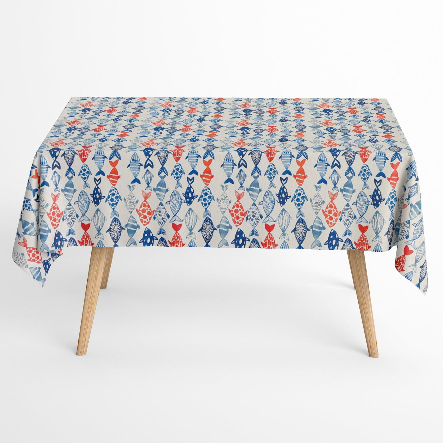 Jacquard Tischdecke aus beschichteter Baumwolle mit maritimem Fischmuster in Blau- und Rottönen auf hellem Hintergrund, fleckenabweisend und pflegeleicht.