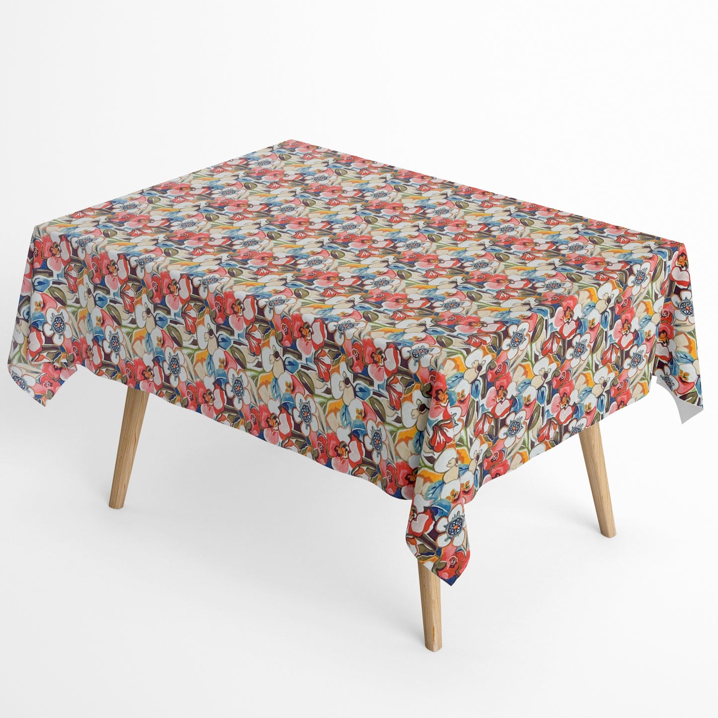 Die Jacquard Tischdecke aus beschichteter Baumwolle zeigt ein dichtes, stilisiertes Blumenmuster mit grafischen Blüten und Blättern in warmen Rot-, Beige- und Blautönen.