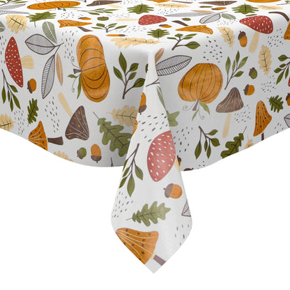 Wachstuch-Tischdecke mit herbstlichem Motiv aus Pilzen, Kürbissen, Eicheln und Blättern in warmen Orange-, Braun- und Grüntönen auf hellem Hintergrund.