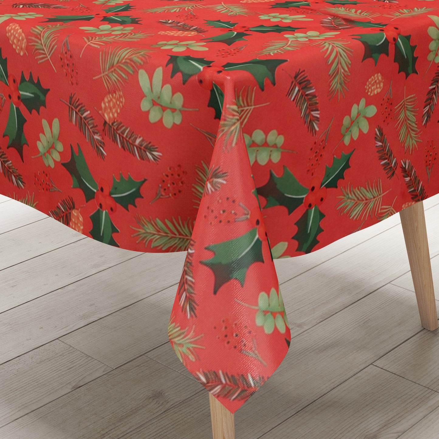 Weihnachtliche Wachstuch-Tischdecke auf rotem Hintergrund mit gleichmäßig verteilten Tannenzweigen, Tannenzapfen, Blättern und kleinen Beeren in einem natürlichen, dekorativen Stil.