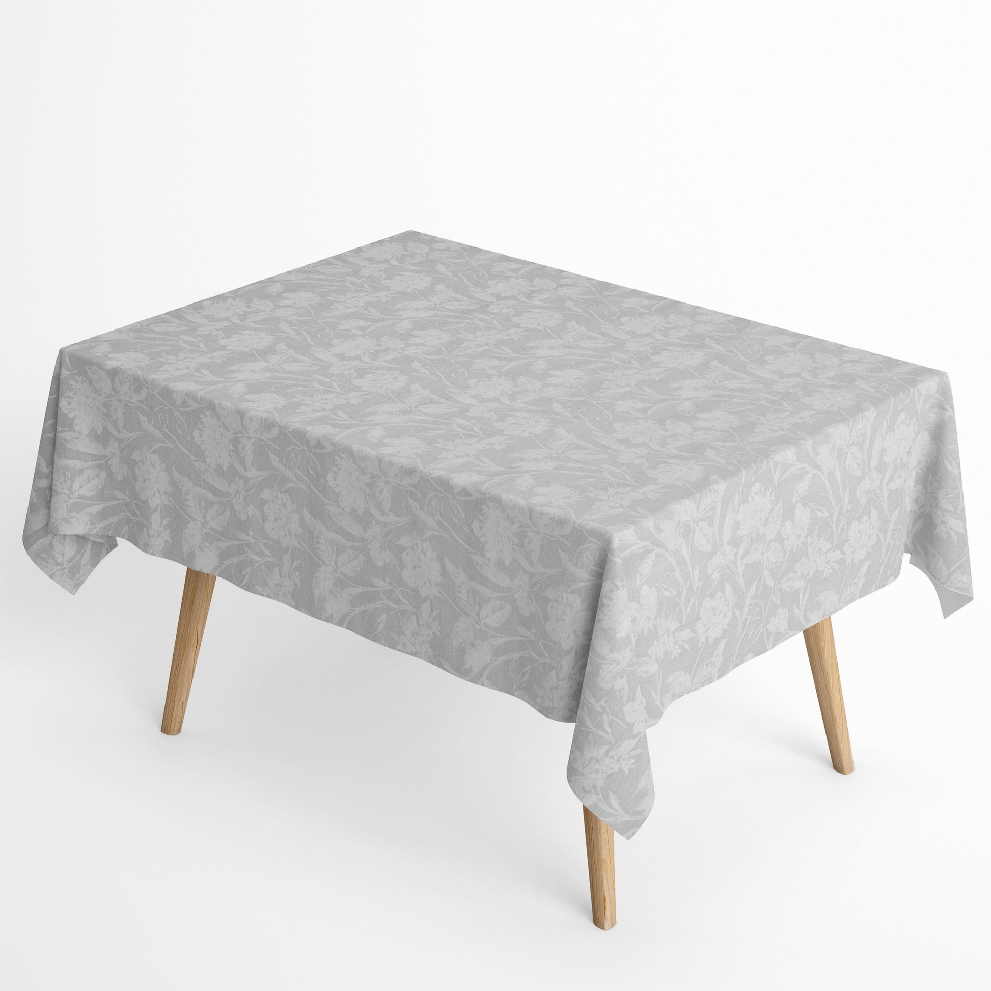 Beschichtete Baumwoll-Tischdecke mit Fleckenschutz im Design CARDUCHO, hellgrauer Hintergrund mit einem dezenten Ton-in-Ton-Allover-Muster aus filigranen Wiesenblumen, Gräsern und Blättern in Weiß.