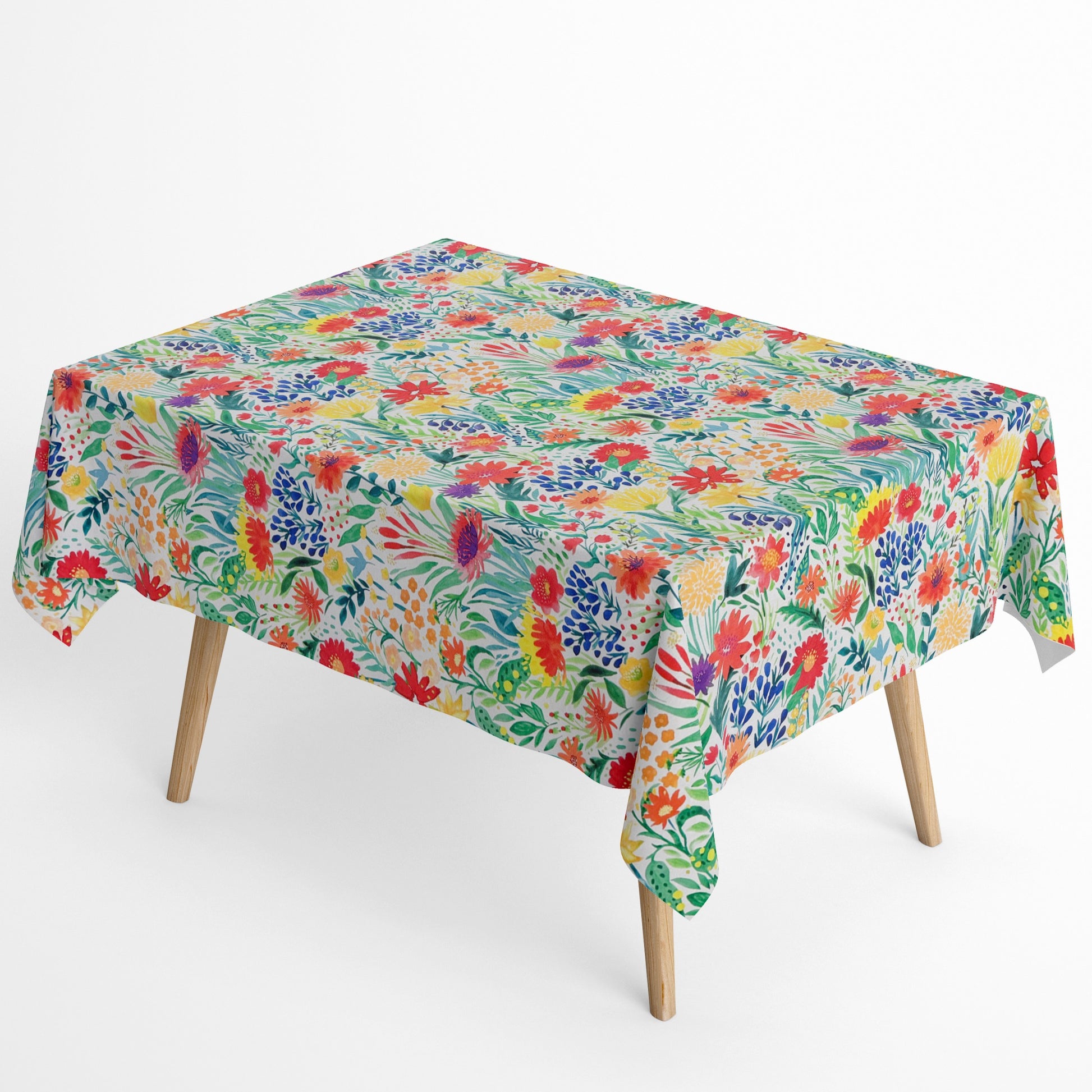 Die Jacquard Tischdecke aus beschichteter Baumwolle begeistert mit einem dynamischen, dicht komponierten Blütenmix in kräftigen Farben.