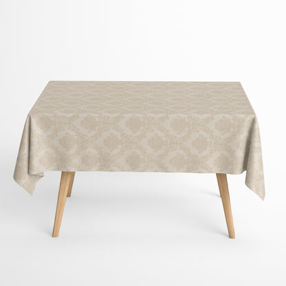 Beige Jacquard-Tischdecke aus beschichteter Baumwolle mit elegantem Ornamentmuster und Fleckenschutz.