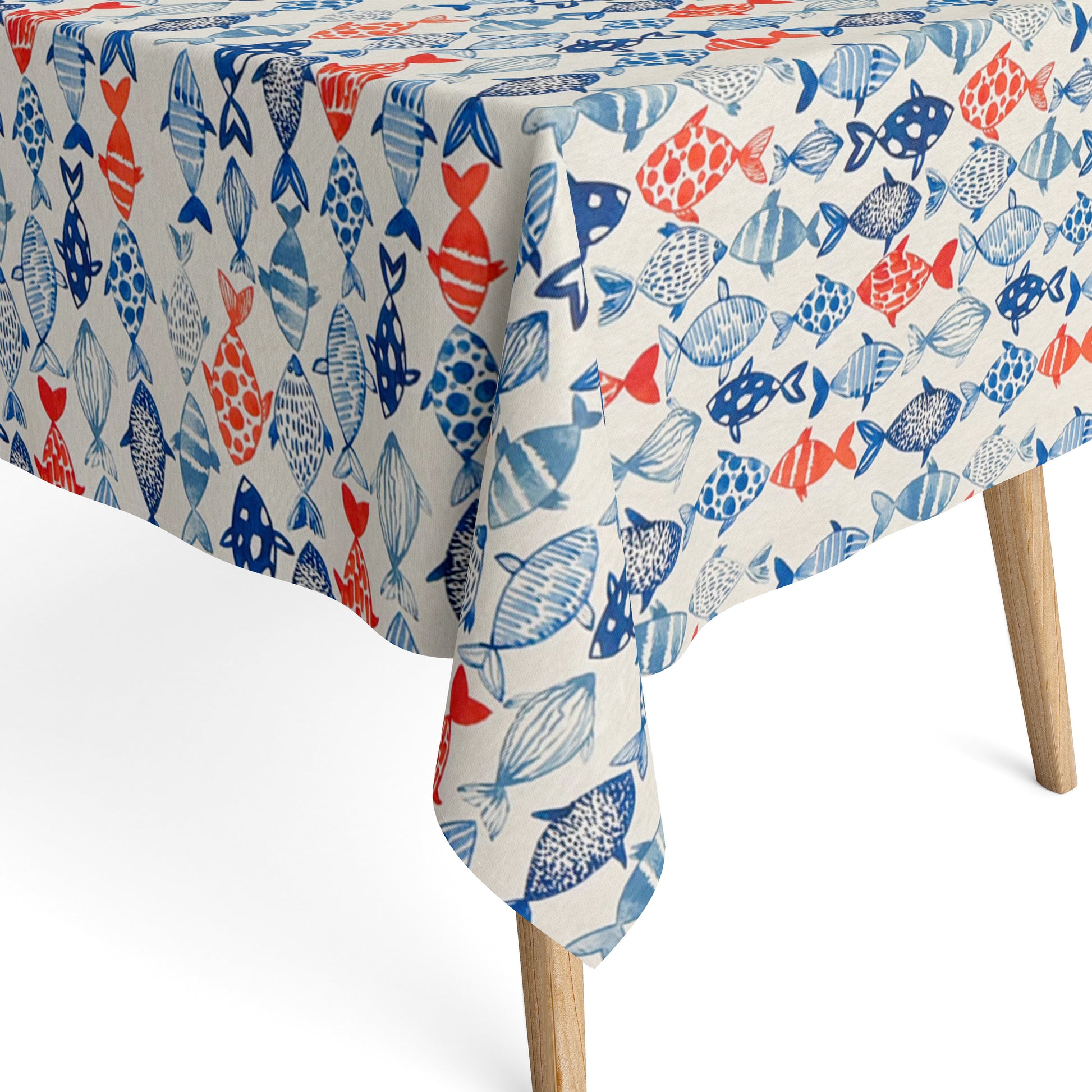 Jacquard Tischdecke aus beschichteter Baumwolle mit maritimem Fischmuster in Blau- und Rottönen auf hellem Hintergrund, fleckenabweisend und pflegeleicht.