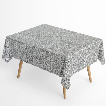 Jacquard Tischdecke aus beschichteter Baumwolle mit feinem Blättermuster aus kleinen Zweigen in Grau- und Naturtönen, fleckenabweisend und pflegeleicht.