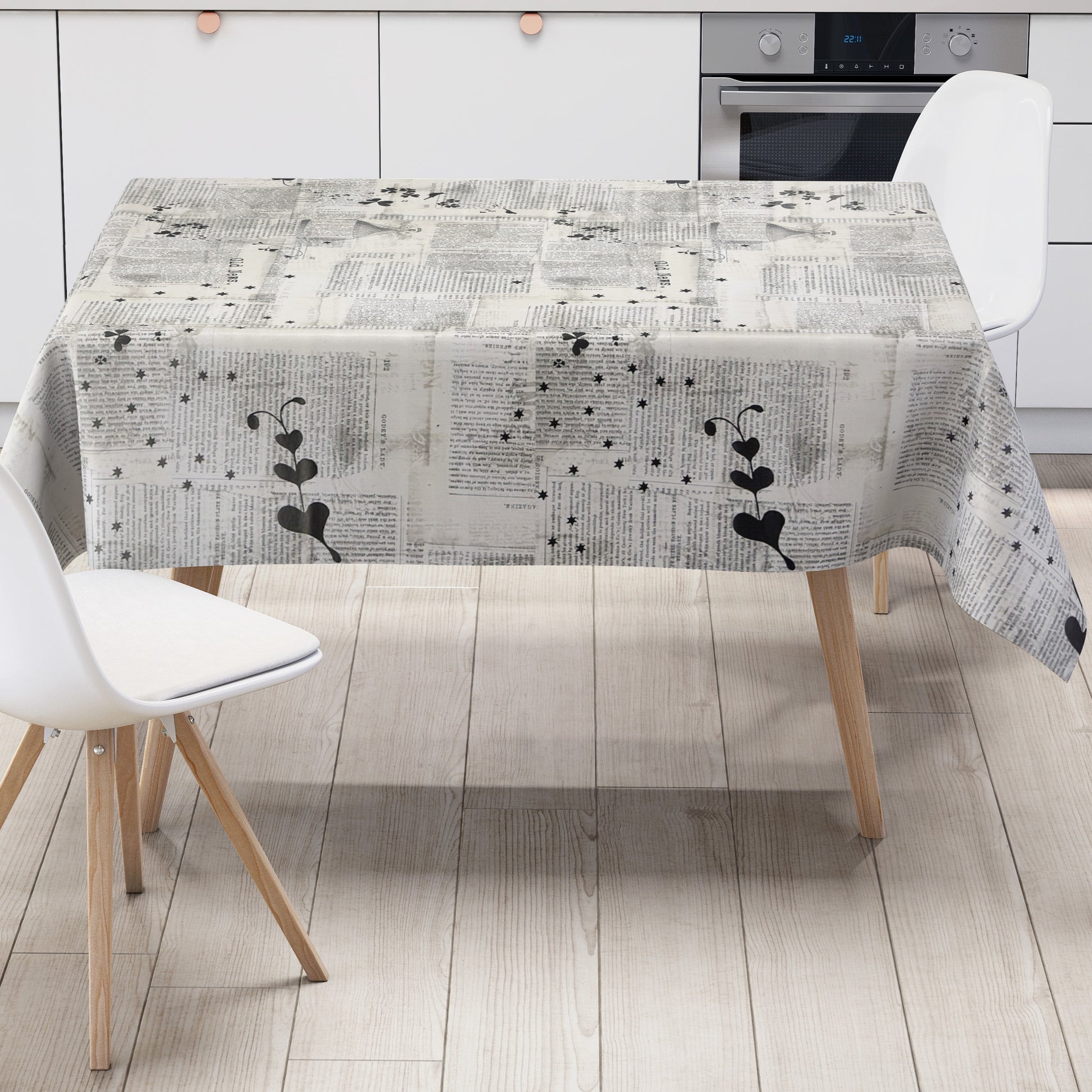 Wachstuch Tischecke Zeitungspapier