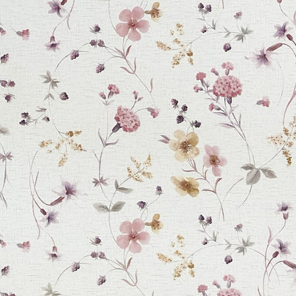 Rechteckige Wachstuch-Tischdecke mit zartem Streublumenmuster in Rosa, Flieder und Gelb auf cremeweißem Hintergrund. Filigrane Blüten, feine Zweige und kleine Blätter verleihen der Tischdecke eine romantische, leichte Ausstrahlung im Landhausstil.