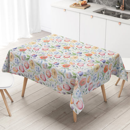 Wachstuch-Tischdecke mit zartem Aquarell-Blumenmuster auf hellem Hintergrund. Tulpen, Mohnblumen und kleine Blüten in Rosa, Orange, Gelb, Blau und Violett werden von grünen Blättern und feinen Zweigen ergänzt.