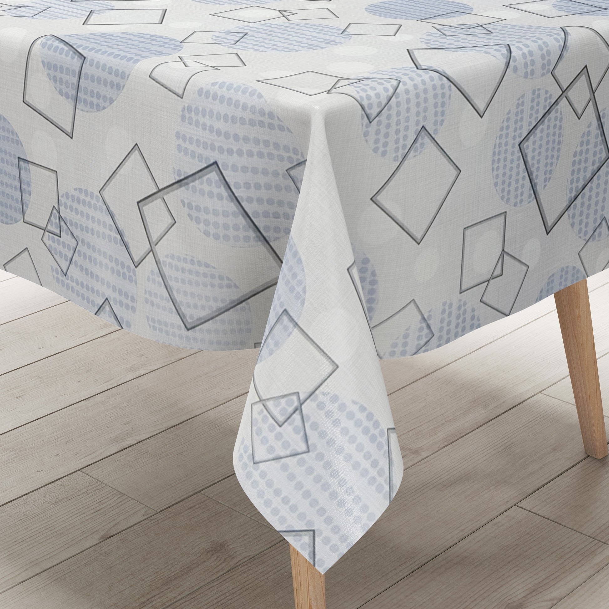 Wachstuch-Tischdecke mit modernem geometrischem Muster in Grau und Hellblau. Transparente Quadrate und Rechtecke überlagern sich auf hellem Hintergrund, ergänzt durch Kreise und feine Punktstrukturen. Das zeitgemäße Design wirkt dezent, elegant und harmonisch.