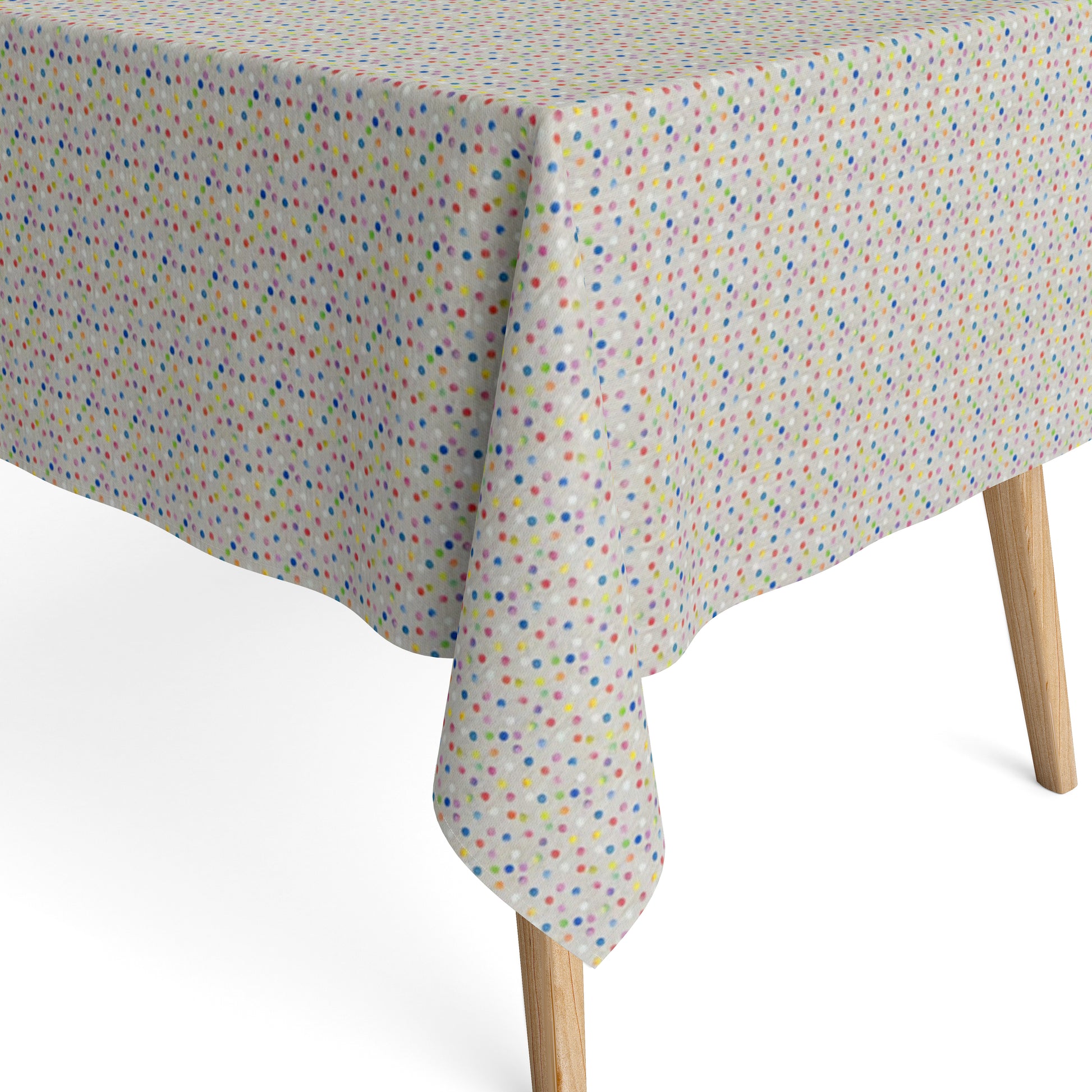 Jacquard-Tischdecke aus beschichteter Baumwolle mit hellem Grund und feinem, buntem Punktmuster in Blau, Rosa, Rot, Gelb, Grün, Orange und Violett.