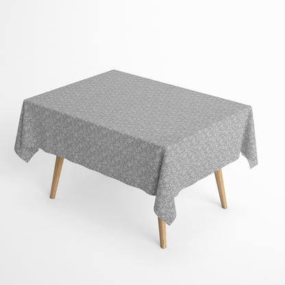 Jacquard-Tischdecke aus beschichteter Baumwolle in Grau mit feinem weißen Streublümchenmuster, fleckenabweisend.