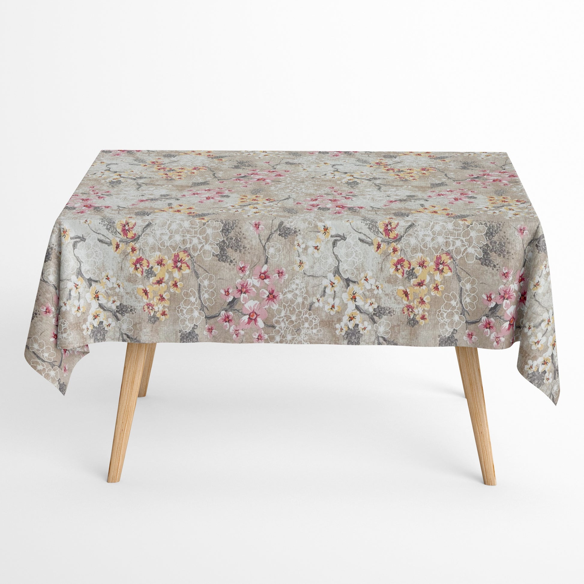 Beschichtete Baumwoll-Tischdecke mit Fleckenschutz im Design ROVIERA, naturfarbener Hintergrund mit zarten Kirschblüten in Weiß, Rosa und Creme auf filigranen Zweigen sowie dekorativen floralen Konturen in Beige- und Grautönen.