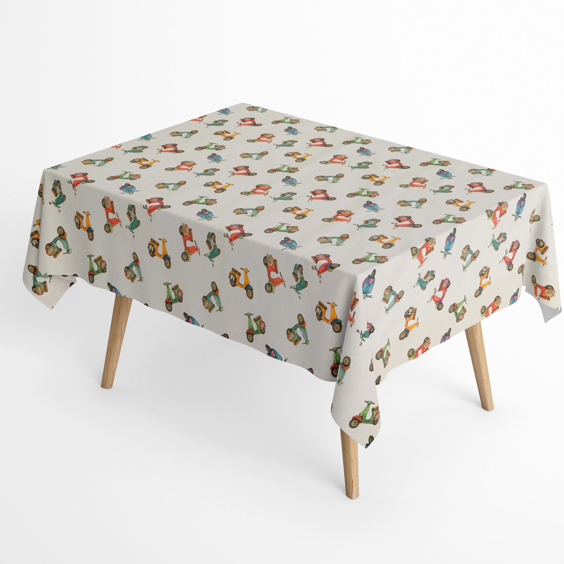  Die Jacquard Tischdecke aus beschichteter Baumwolle zeigt ein verspieltes Muster mit kleinen, farbenfrohen Motorrollern in Rot, Grün, Blau und Gelb auf hellem Hintergrund. Die feine Webstruktur sorgt für Qualität, während die Beschichtung sie fleckenabweisend macht. 